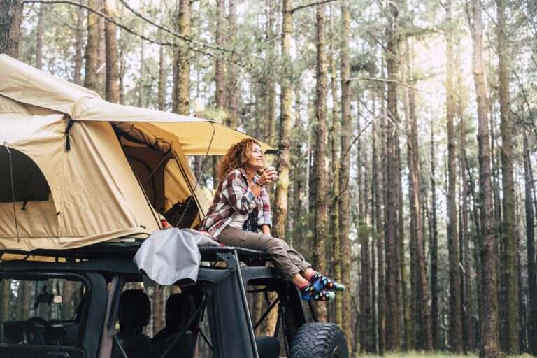 young woman sitting outside tent on the roof of th 2022 01 18 23 55 22 utc min